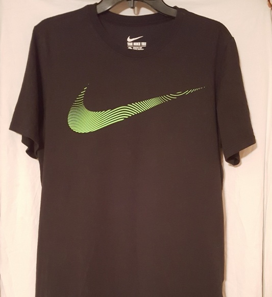 black nike shirt with green swoosh